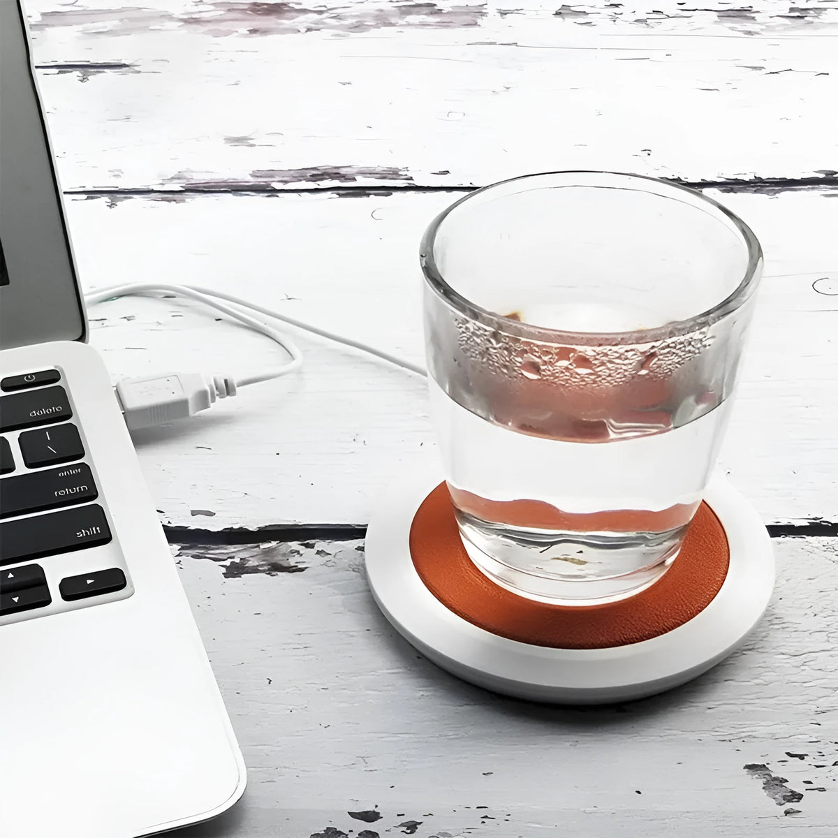 USB heated coaster with PU leather surface in black, blue, and orange colours for drink warming