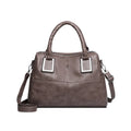 Women's large capacity shoulder bag in horizontal square shape with internal phone and document pockets.