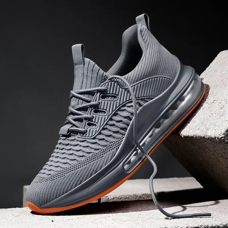 Men's solid-colour low-top mesh running shoes with lace-up front and rubber sole.