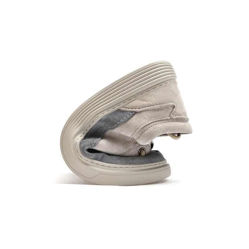 Men's grey pigskin leather casual skate shoes with a flat rubber sole and lace-up front.