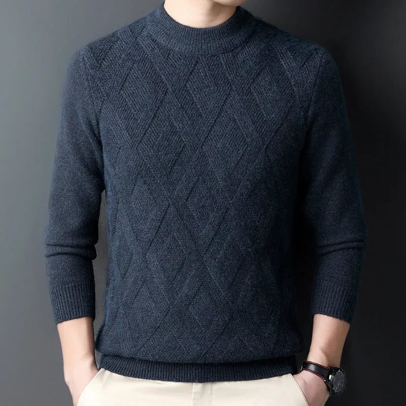 Man wearing a thick diamond jacquard pattern wool blend pullover sweater in a neutral colour.