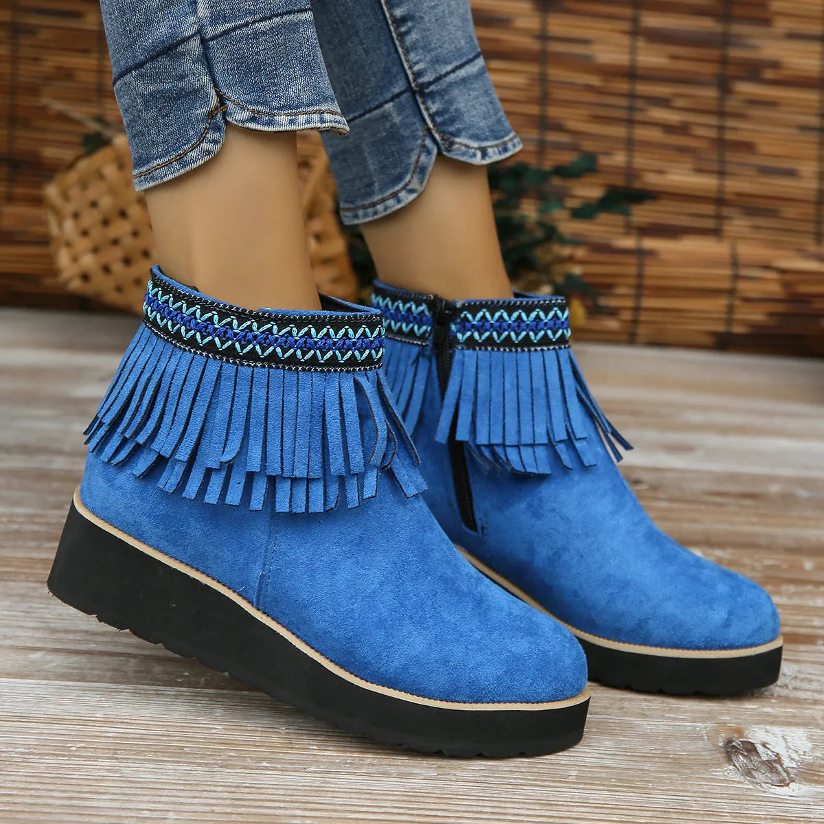 Women's dark brown suede wedge ankle boots with side zip, waterproof platform, and tassel detail.