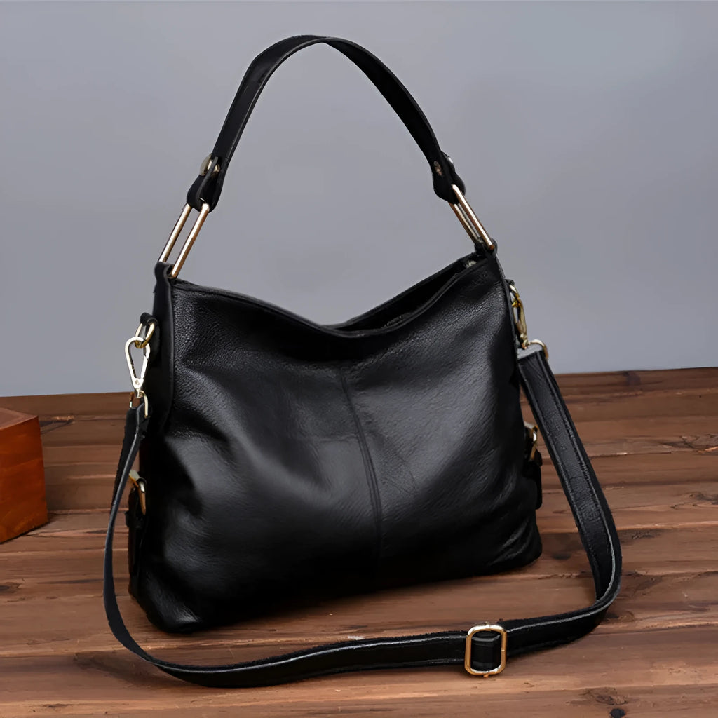 Genuine leather crossbody bag in square vertical shape with internal zipper organisers