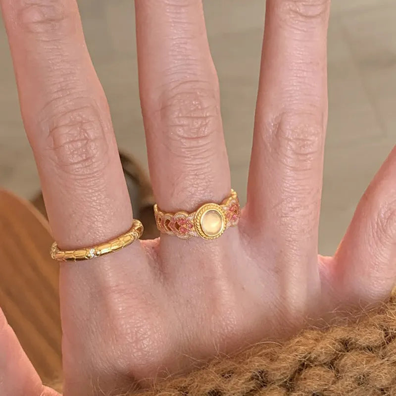 Pink crystal enamel geometric open mouth ring for women with gold plating.
