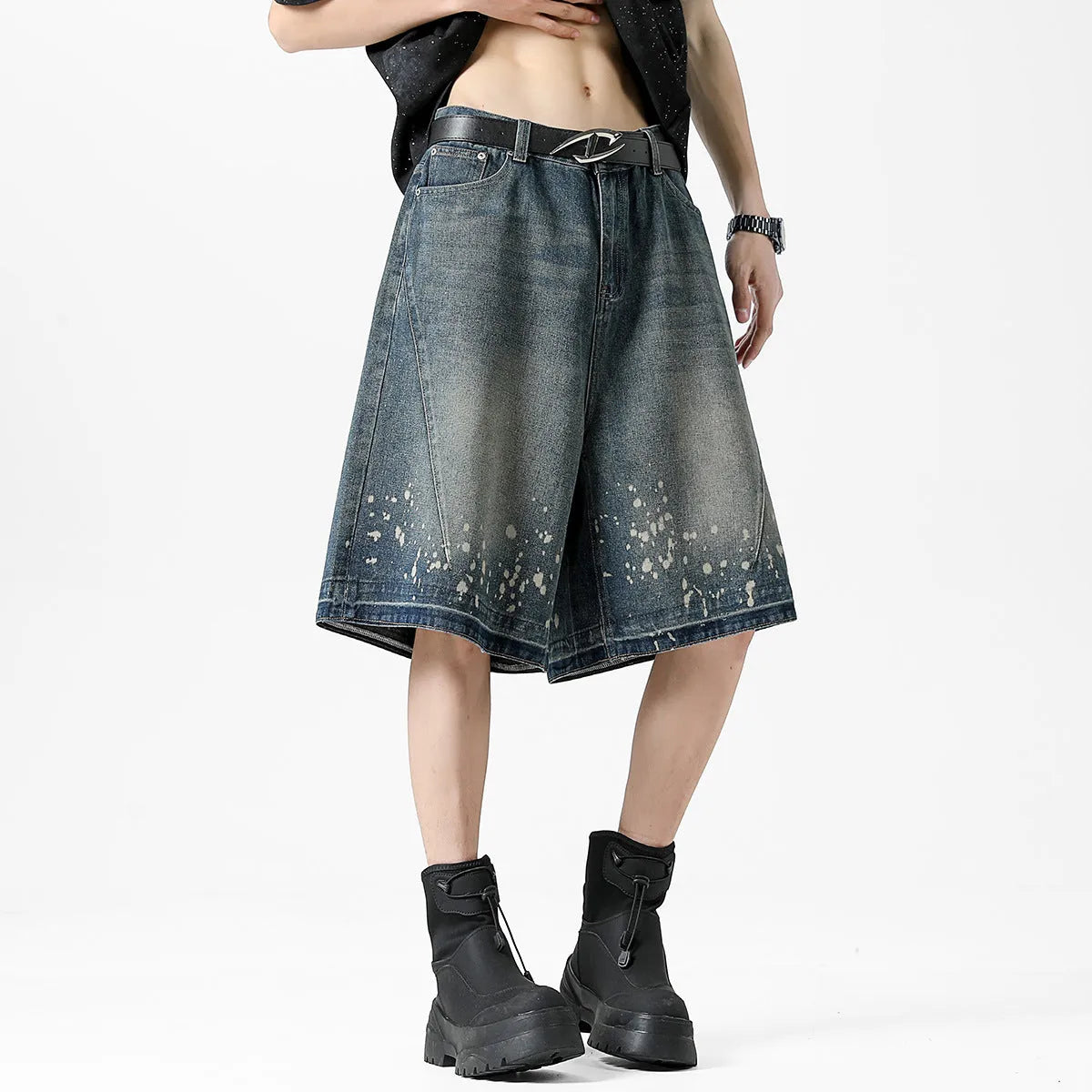 Men's retro washed blue denim shorts with splash ink detailing and ripped accents