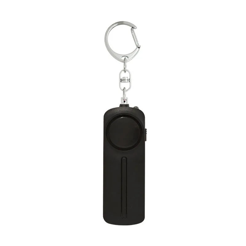 Compact pink personal safety alarm with keyring, showing dimensions 86mm by 30mm.