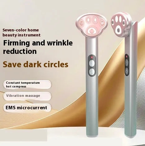 Gradually varied pink gradient eye massager with micro-current vibration and colour light therapy functions