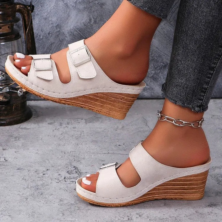 Women's wedge buckle beach slippers in creamy-white, black and maroon colour options