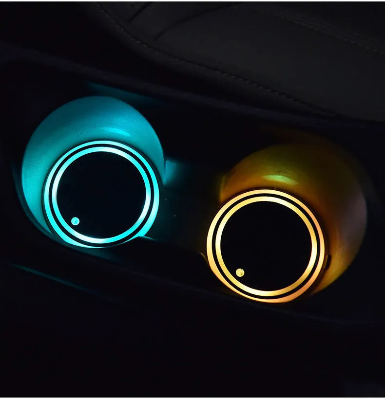 Colourful LED light-up coaster for car cup holder showing seven light modes on a non-slip acrylic surface.