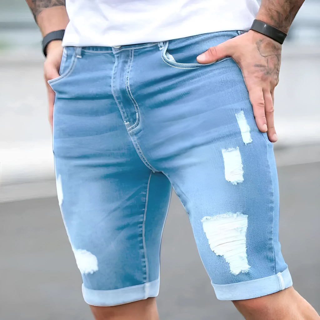 Men's sky blue denim shorts with multi-hole distressed design, low waist straight cut silhouette