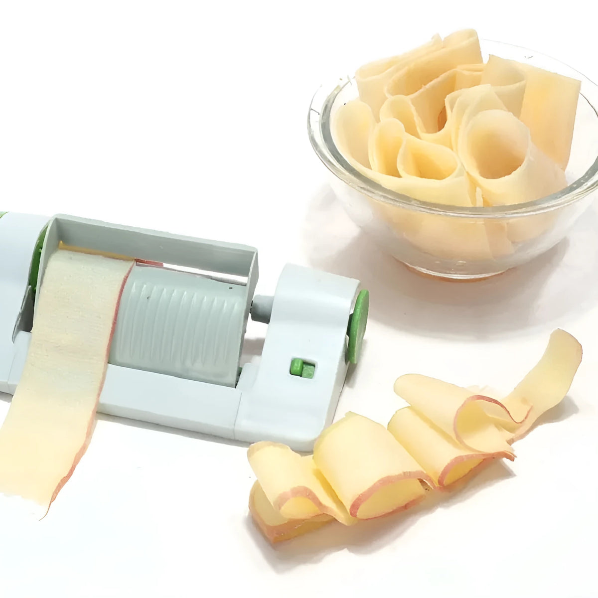 Green and white ABS and PP plastic kitchen multifunctional fruit slicer, 22.5cm by 10.5cm by 5.5cm
