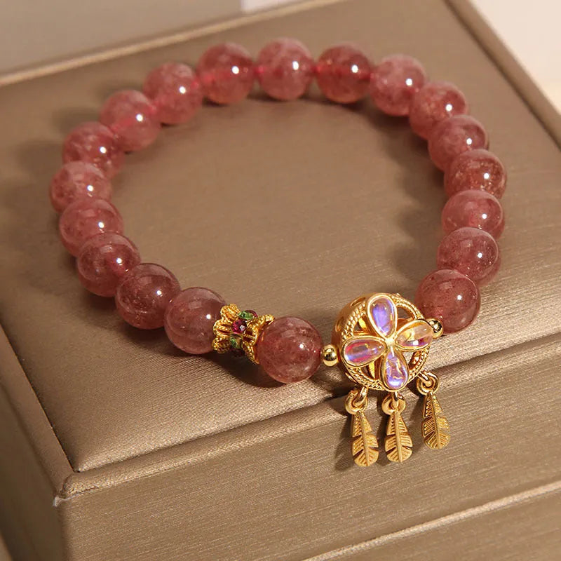 Women's strawberry quartz bracelet with four leaf clover dream catcher pendant charm