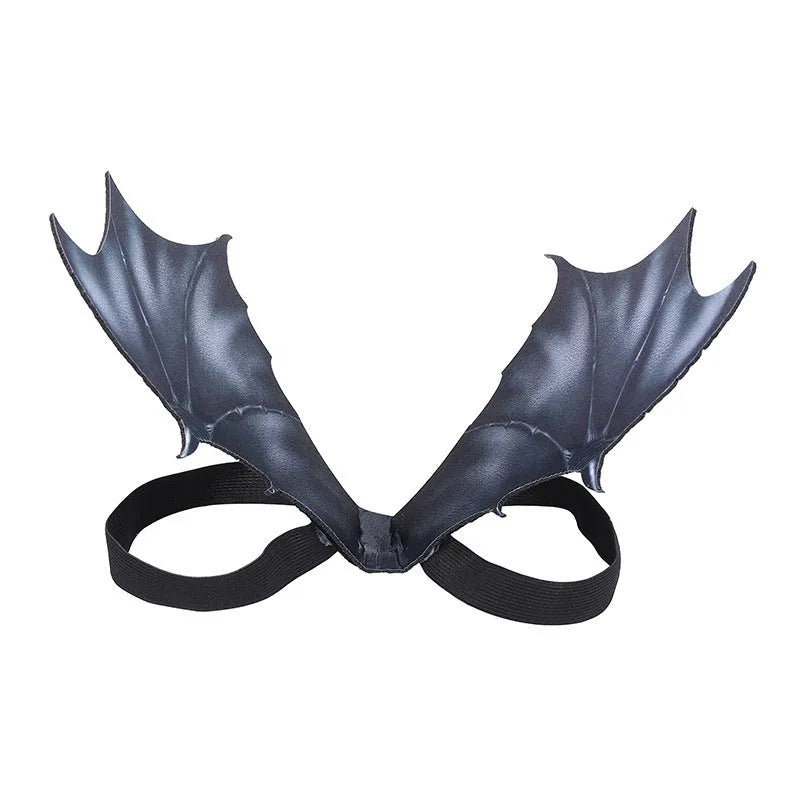 Black cloth bat wings costume for a dog or cat on a Halloween background