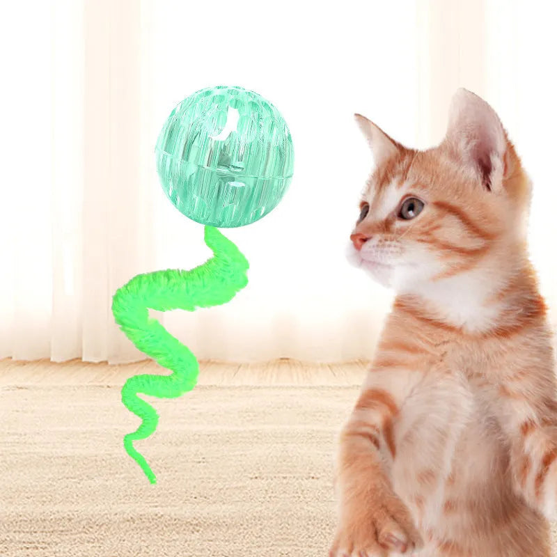 Interactive cat ball toy with bouncy TPR rubber core and removable plush tail, shown in green colour