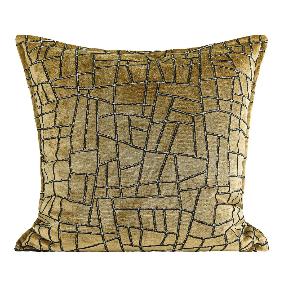 Gold geometric abstract pattern on a velvet square decorative cushion on a grey sofa.