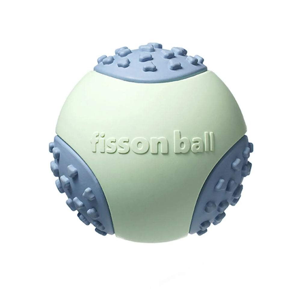 Green and pink dog rolling ball toy showing 64mm diameter size for small and medium breeds