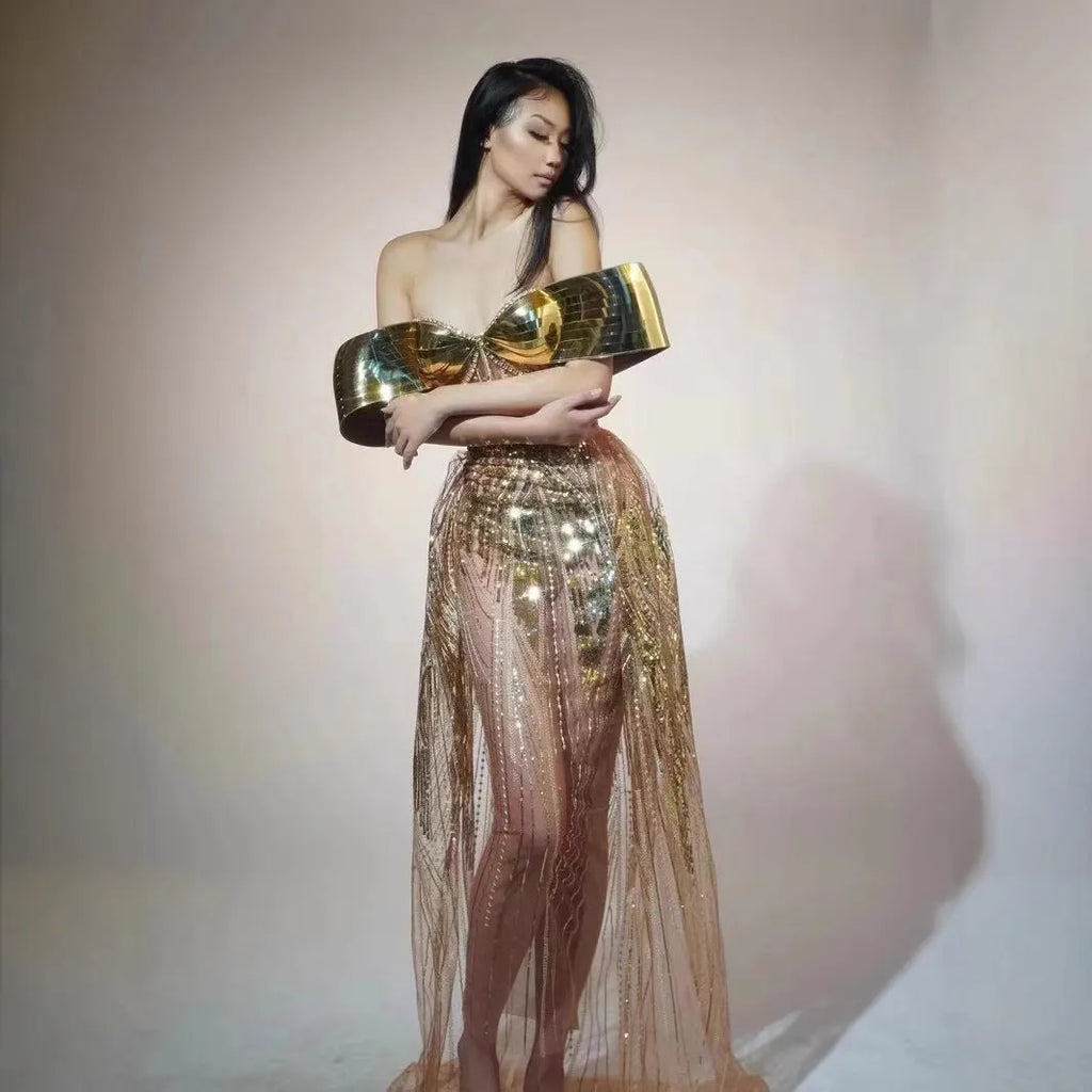 Gold strapless sequined evening dress with tulle skirt and high split detail