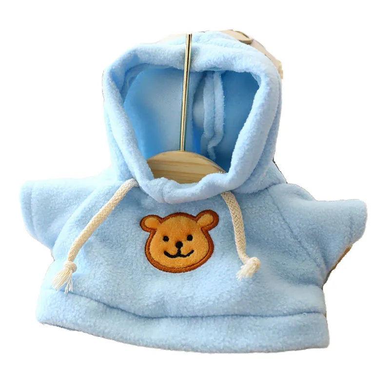 Dog wearing blue hooded sweater from pet clothing range with 23cm and 42cm sizes
