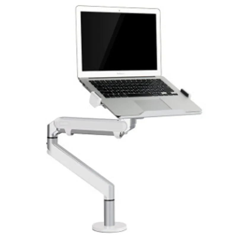 Black aluminium Free Hover adjustable laptop stand mounted on a desk edge, holding a silver notebook.