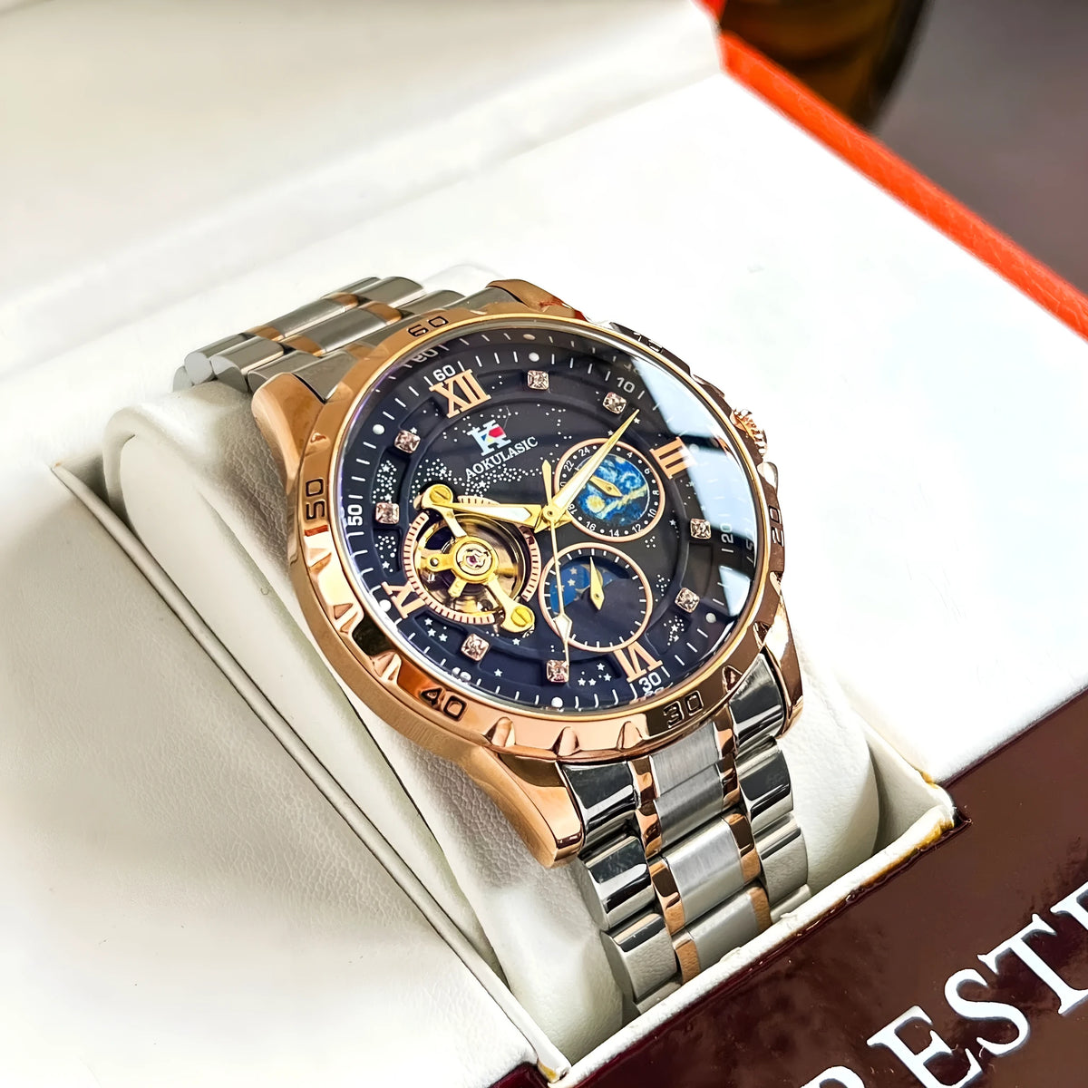 Automatic mechanical men's watch with rose gold shell and black dial showing large multifunctional display