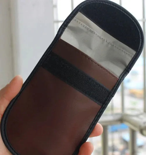Black microfiber Faraday cage bag for car key signal blocking measuring 13.5 by 9.5 centimetres