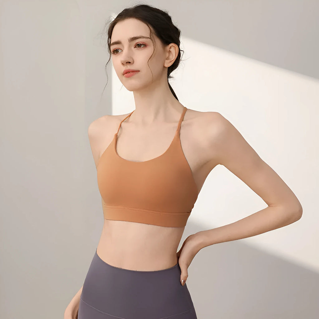 Women's nylon sports vest with fixed double-shoulder straps in multiple colours on a size chart.