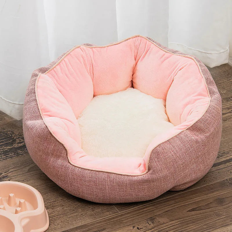 Blue octagonal pet bed with high sides, soft interior, and a removable mat for a cat or small dog.
