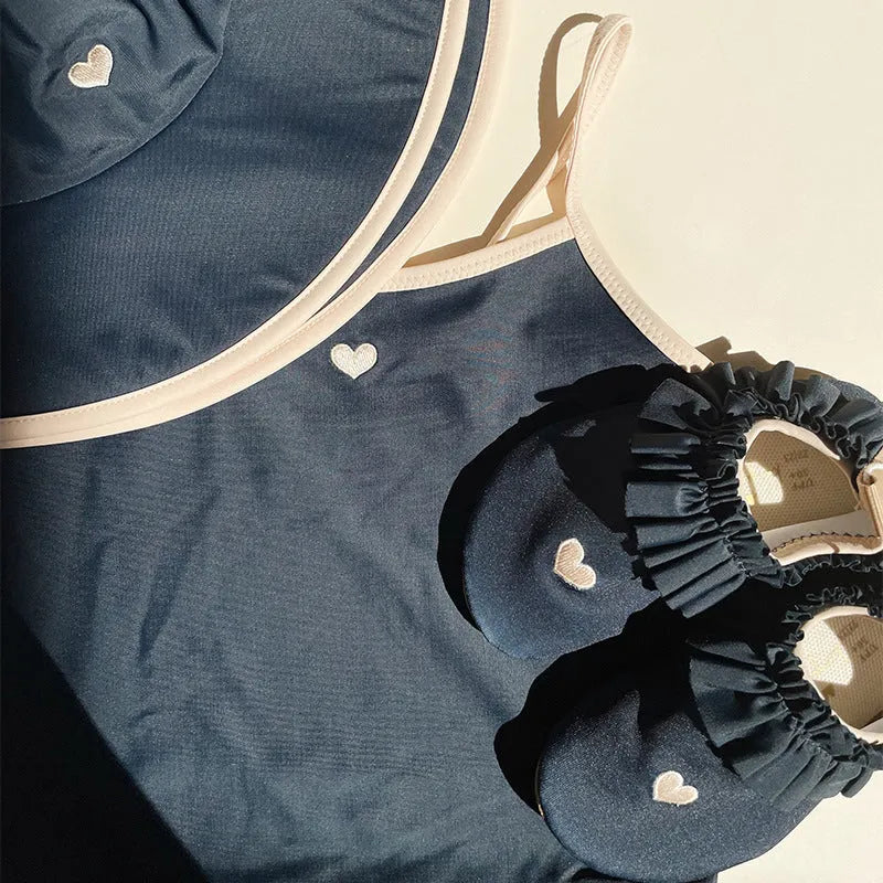 Dark blue split baby swimsuit for girls aged 1-6 years in briefs style with high elasticity construction