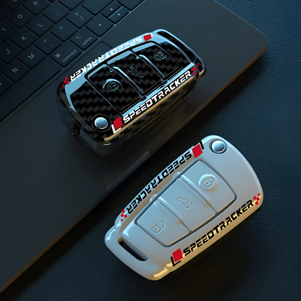Carbon fibre pattern car key cover with mirrored surface elements in carbon black colour