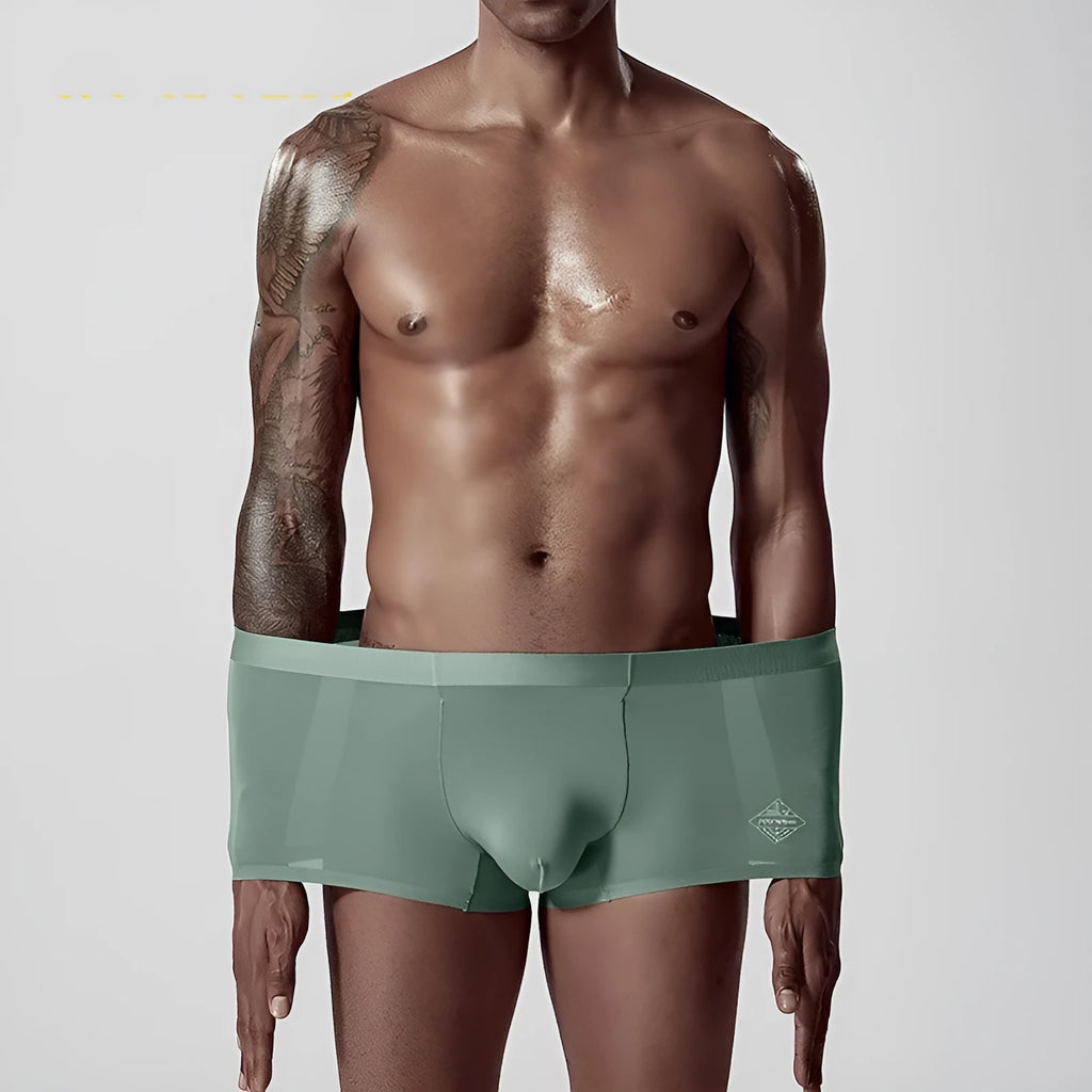 Men's seamless modal underwear in mid-waist style showing white, pink, and green colour options