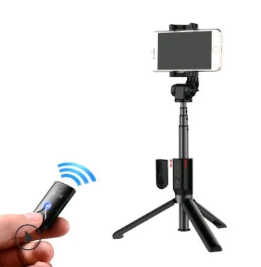 Black Bluetooth selfie stick with extended phone clamp and folded tripod legs