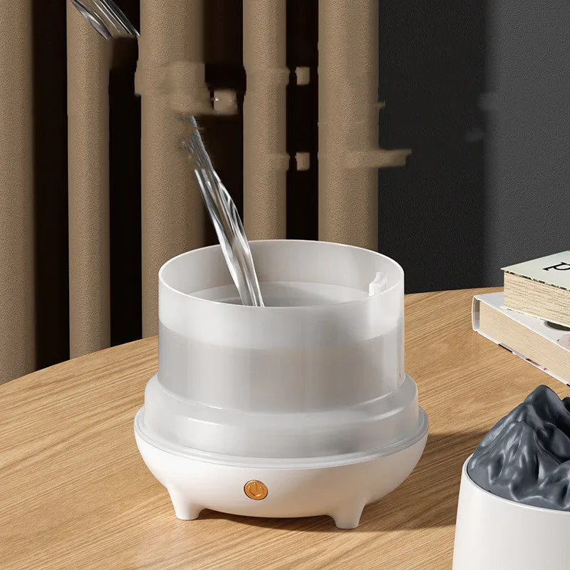 Volcano humidifier with flaming mountain design in black or white colour
