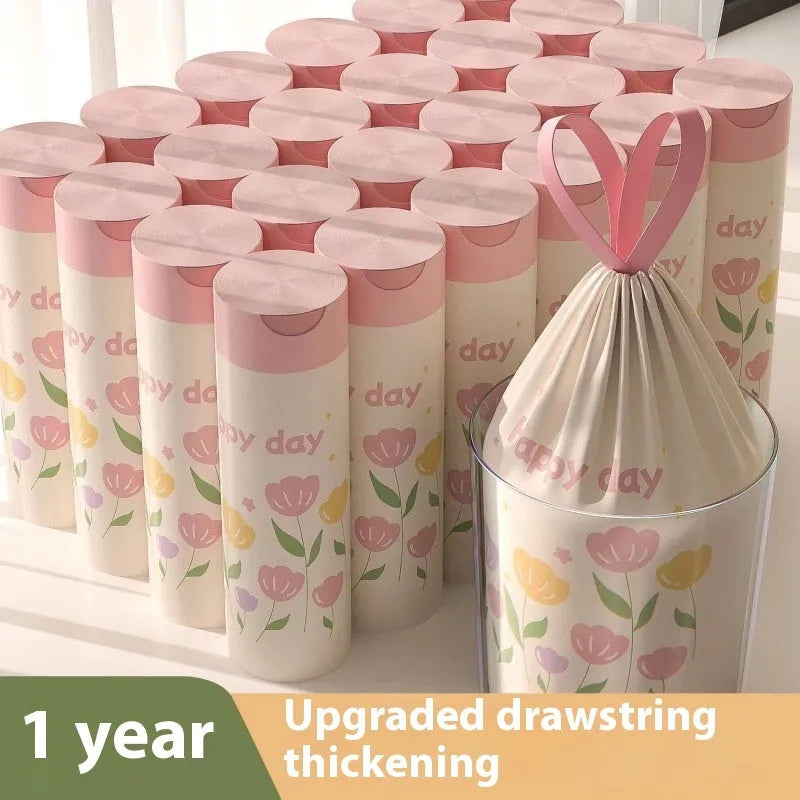 Pink degradable household garbage bags with drawstring closure and mosquito repellent properties