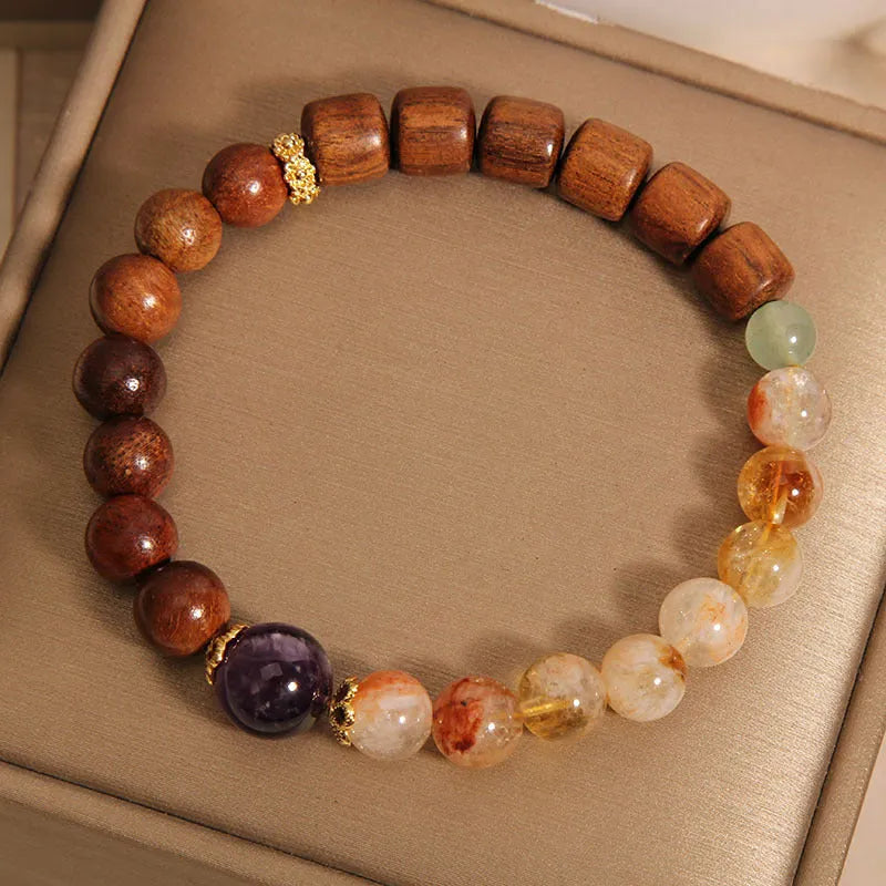Women's bracelet with yellow tower crystal, ebony amethyst beads, pearl and rhinestone detailing in pineapple yellow colour.