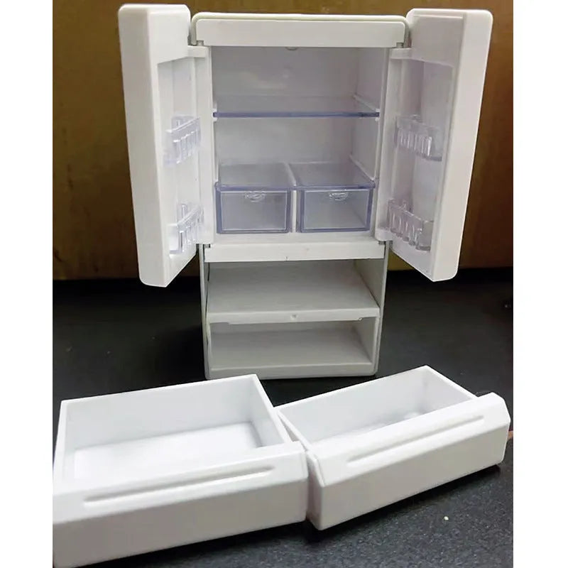White plastic miniature candy toy model with lights on, showing detailed scene.