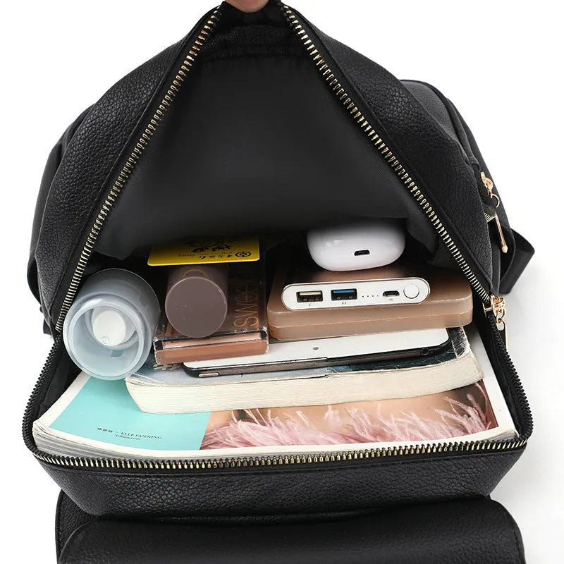 Women's leather backpack with advanced texture design showing three-dimensional pockets in street trend style
