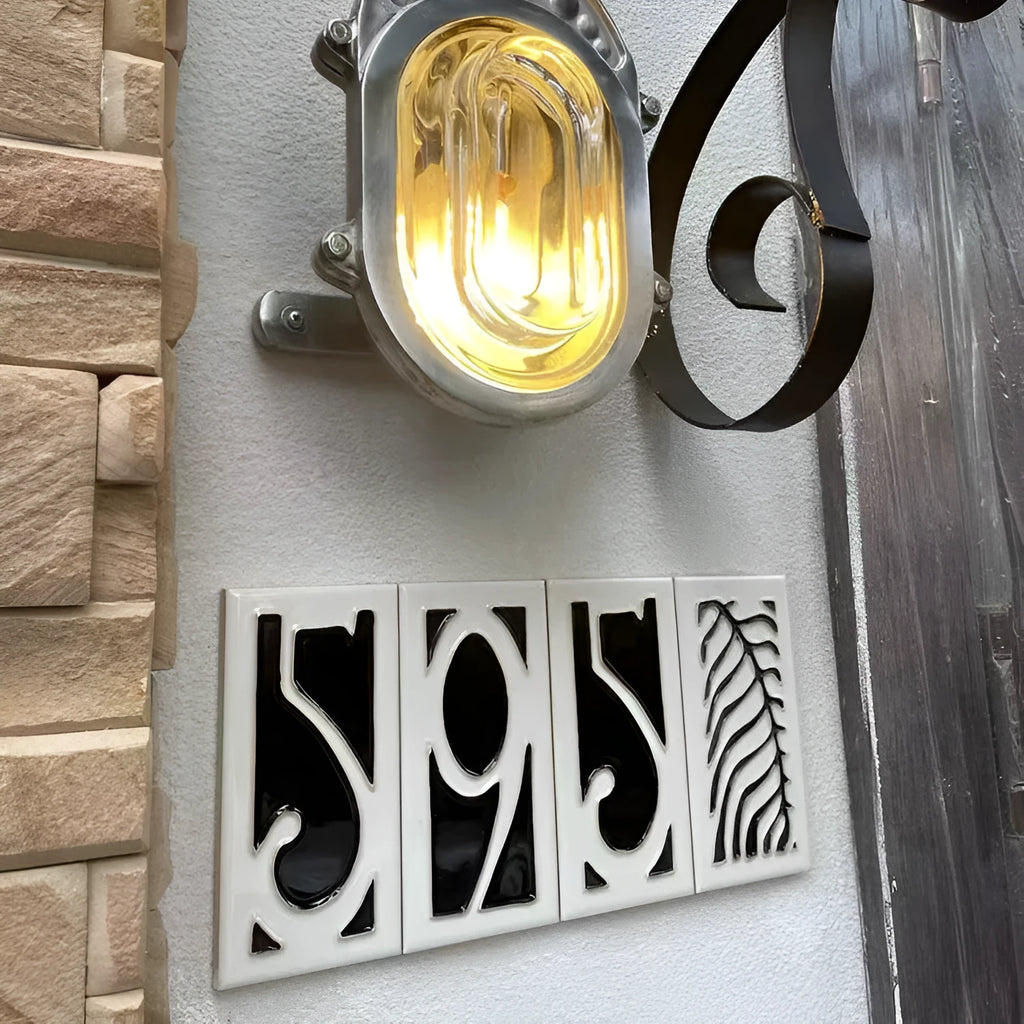 Handmade retro-style ceramic doorplate showing a number, measuring 76mm by 152mm.