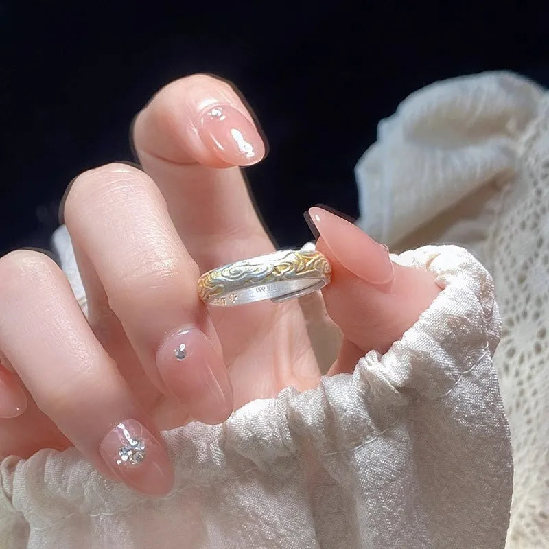 Adjustable open mouth ring with Xiangyun pattern in gold electroplated finish