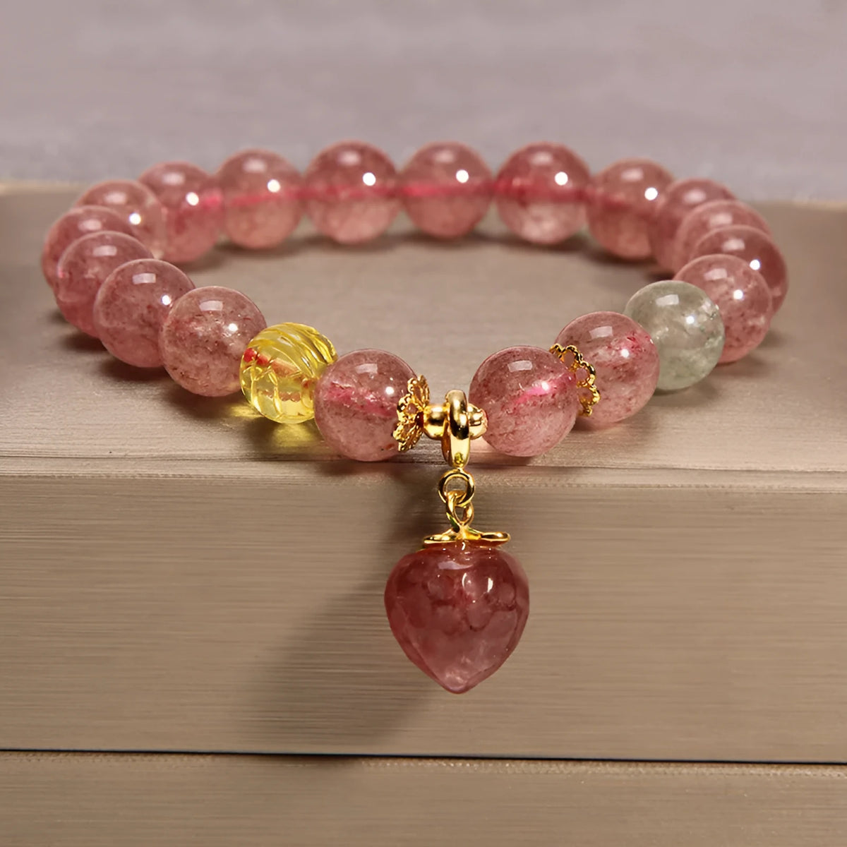 Women's multi-strand crystal bracelet with garnet, pearl, quartz, and jade pendants in Korean style design.