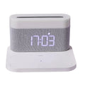 Black and white wireless charging desktop clock with integrated night light and digital display
