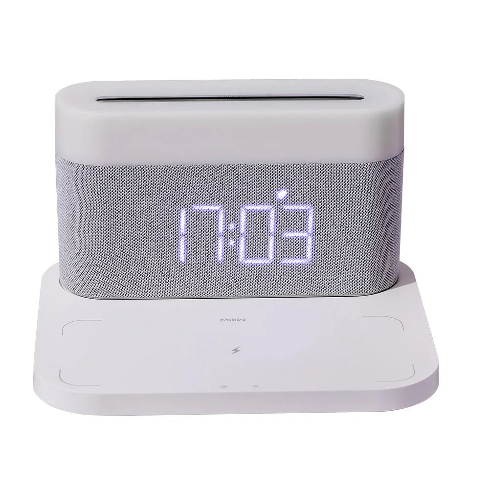 Black and white wireless charging desktop clock with integrated night light and digital display