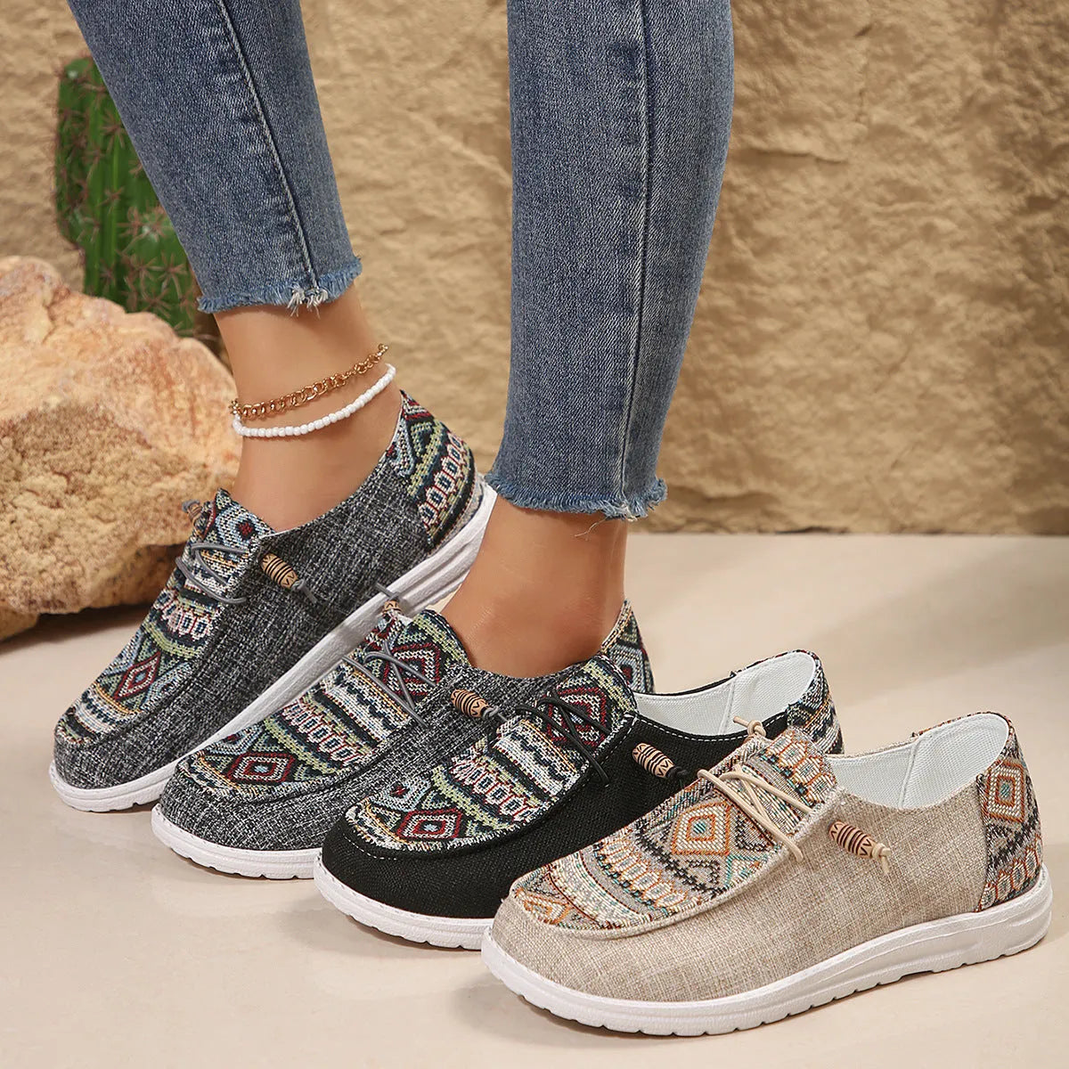 Women's flat slip-on shoes with round toe design in black, dark grey, or khaki colours