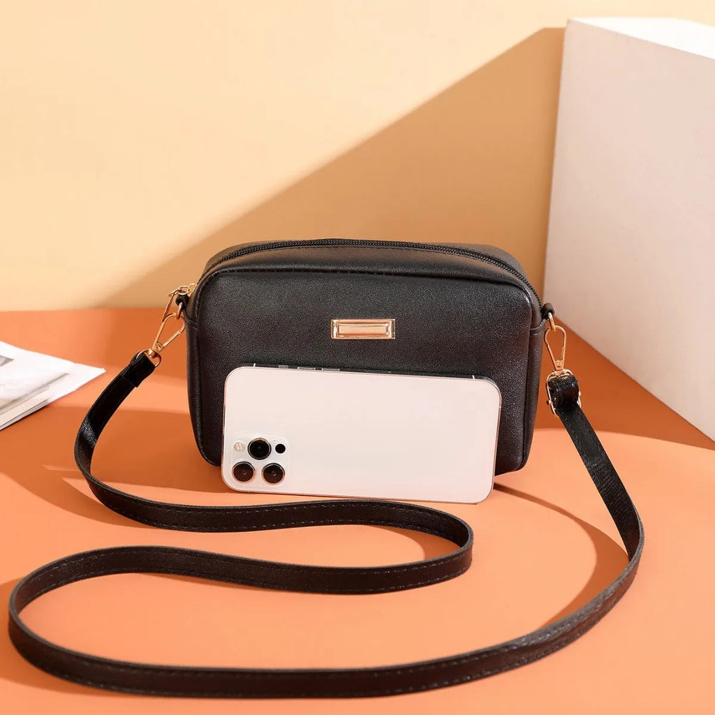 Solid colour PU leather ladies shoulder bag with three-dimensional pocket design in horizontal square shape