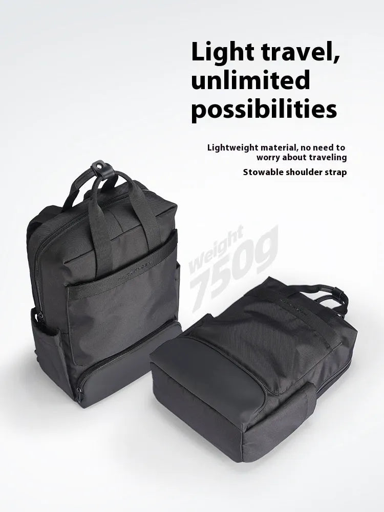 Black Oxford cloth computer backpack with a 20-35 litre capacity for laptop storage.