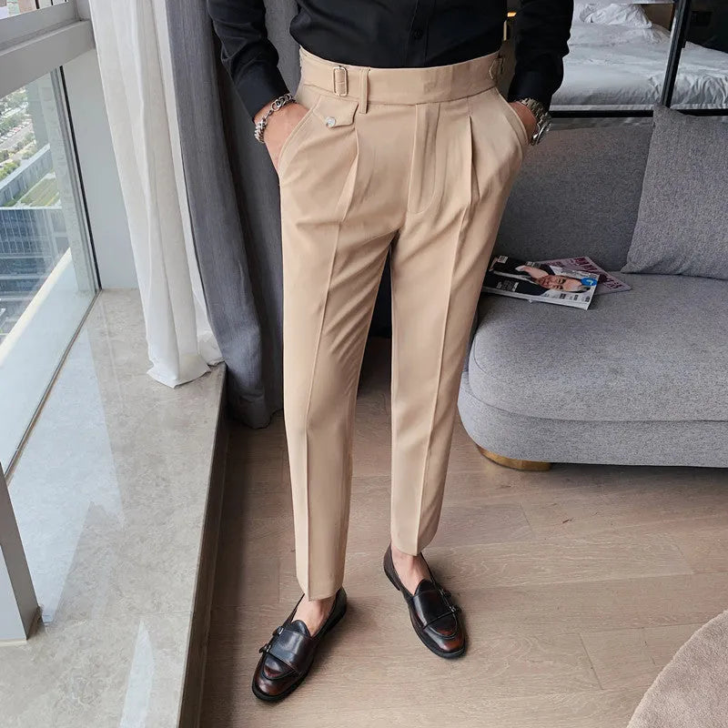 Straight-leg casual trousers in solid colour on a hanger, showing the classic cut and polyester fabric.