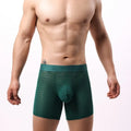 Men's white lace mesh boxer shorts with geometric knit pattern and low waist design