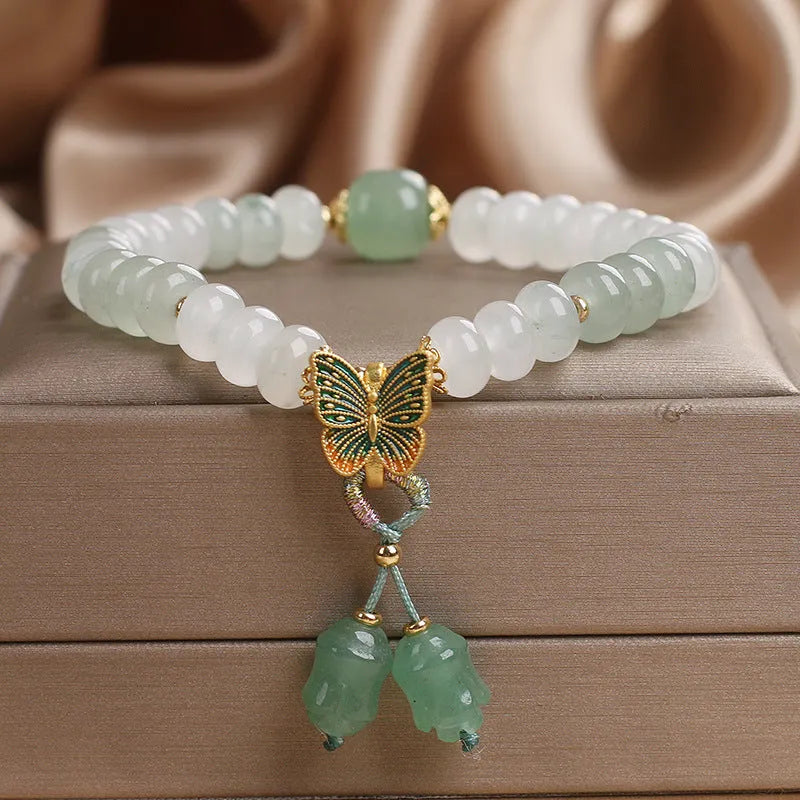 Green Tian Shan Cui abacus bead bracelet with retro butterfly tassel and pearl decoration