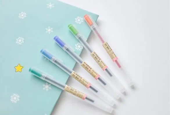 Set of twelve black Muji gel pens with 0.5mm fine tips and ink prevention mechanism