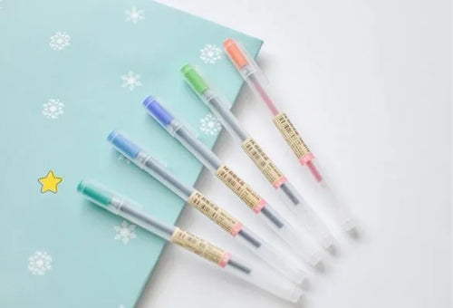 Set of twelve black Muji gel pens with 0.5mm fine tips and ink prevention mechanism