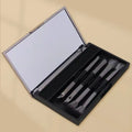 Makeup brush set with mirror in a case, showing silver and gold plastic handle options.